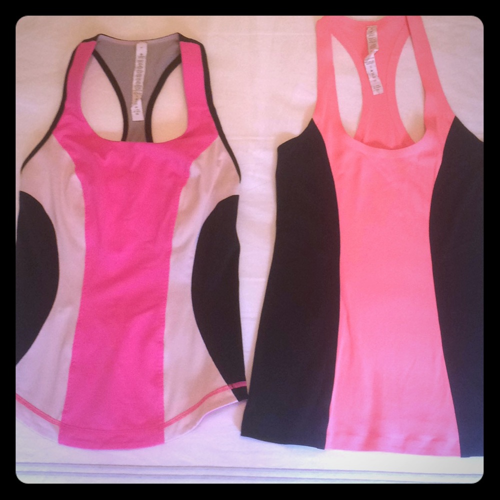 Set of 2 Lululemon tanks Pink Black Orange Size 4